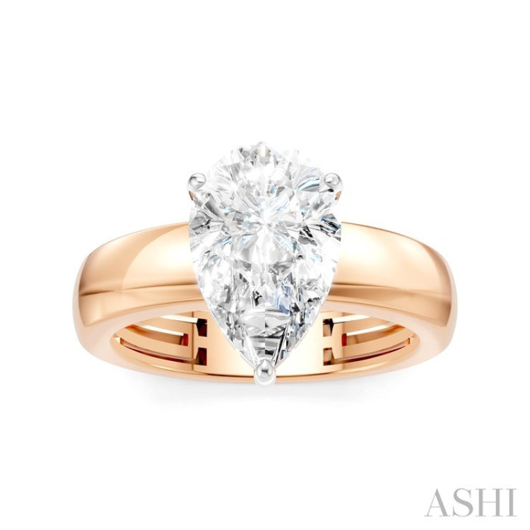 1/10 Ctw Pear Shape Round Cut Diamond Semi-Mount Engagement Ring in 14K Rose and White Gold