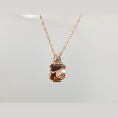 A beautiful custom rose gold and radiant tourmaline pendant. The pedant features a 1.11ct radiant tourmaline with a 0.05ct accent diamond in the bale. 