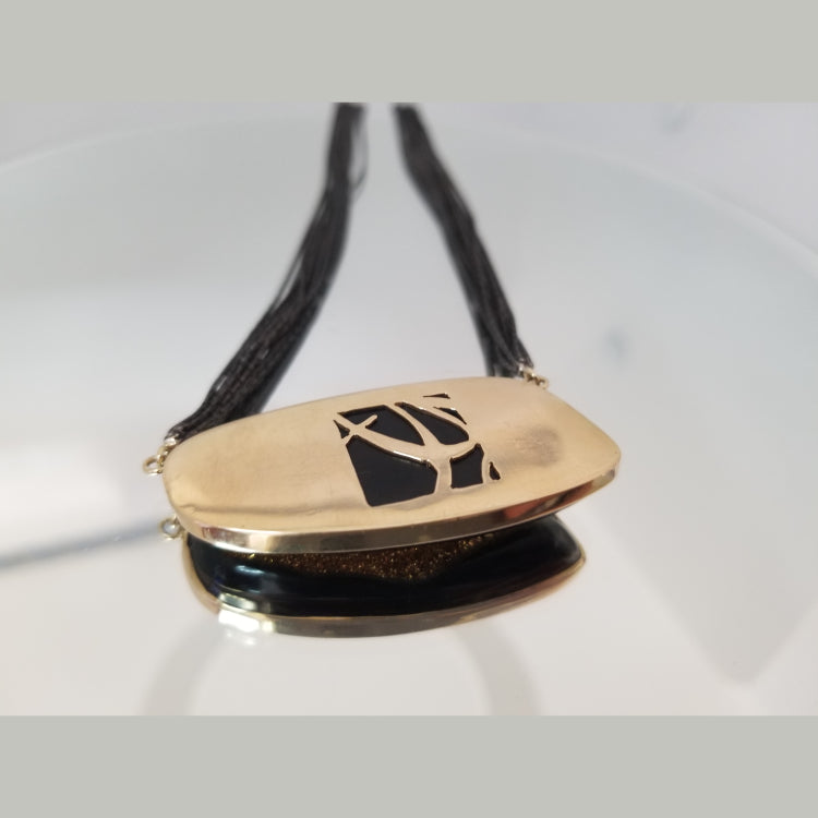 A custom Gold Corner Design Necklace With A Sideways Two Tone  Druzy. Set In 14K Yellow Gold On A Sterling Silver Multi Strand Chain, With Black Rhodium Finish.