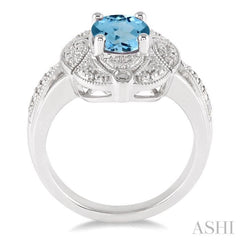 9x7 MM Oval Cut Blue Topaz and 1/50 Ctw Round Cut Diamond Ring in Sterling Silver