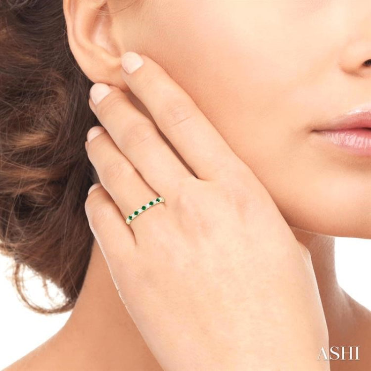 1.75 MM Emerald and 1/6 Ctw Round Cut Diamond Precious Wedding Band in 14K Yellow Gold